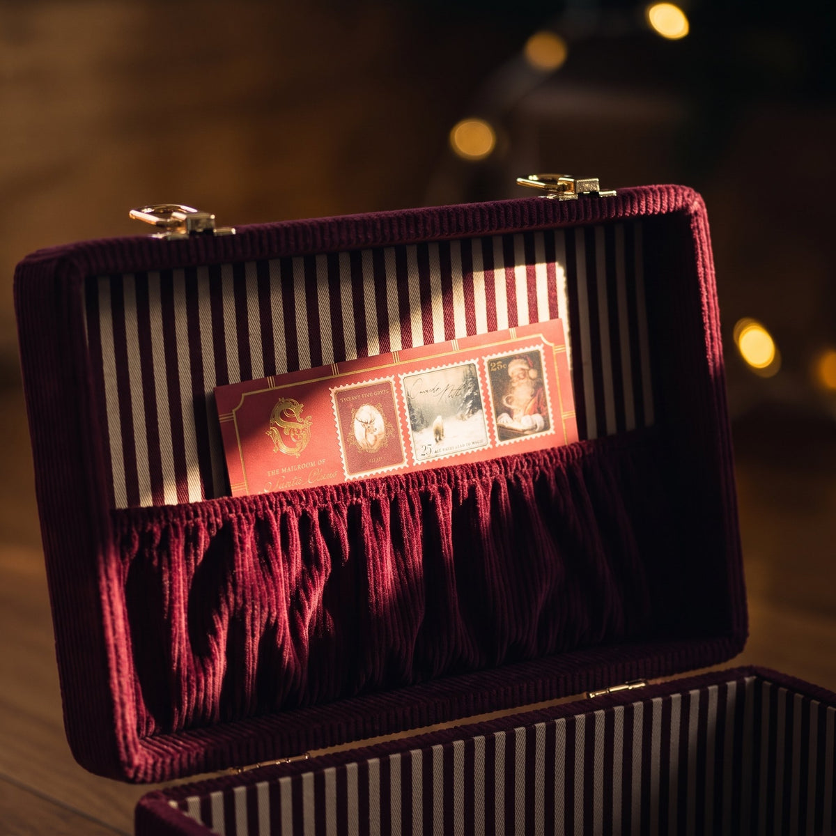 A letter from Santa tucked into the gathered corduroy pocket inside the lid of the Christmas Eve Trunk